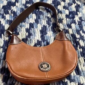 Dooney & Bourke Brown Hobo Bag with Pebbled Leather and Gold Emblem
